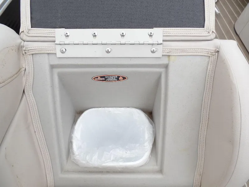 Slide: The Image of 2018 Harris Cruiser 240 boat seat with built-in storage compartment. - 3