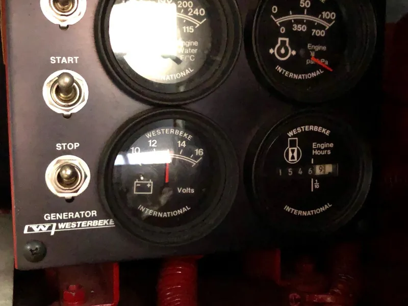 Slide: The Image of Close-up of Westerbeke generator control panel on 1998 Carver 530 Voyager Pilothouse. - 32