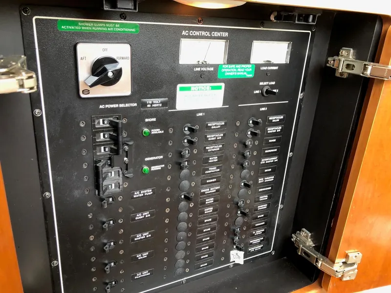 Slide: The Image of AC control center panel of a 1998 Carver 530 Voyager Pilothouse yacht. - 4