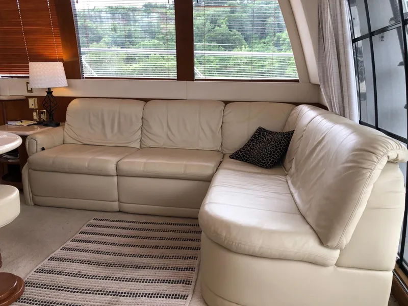 Slide: The Image of Luxurious interior of 1998 Carver 530 Voyager Pilothouse with cream leather sofa. - 11