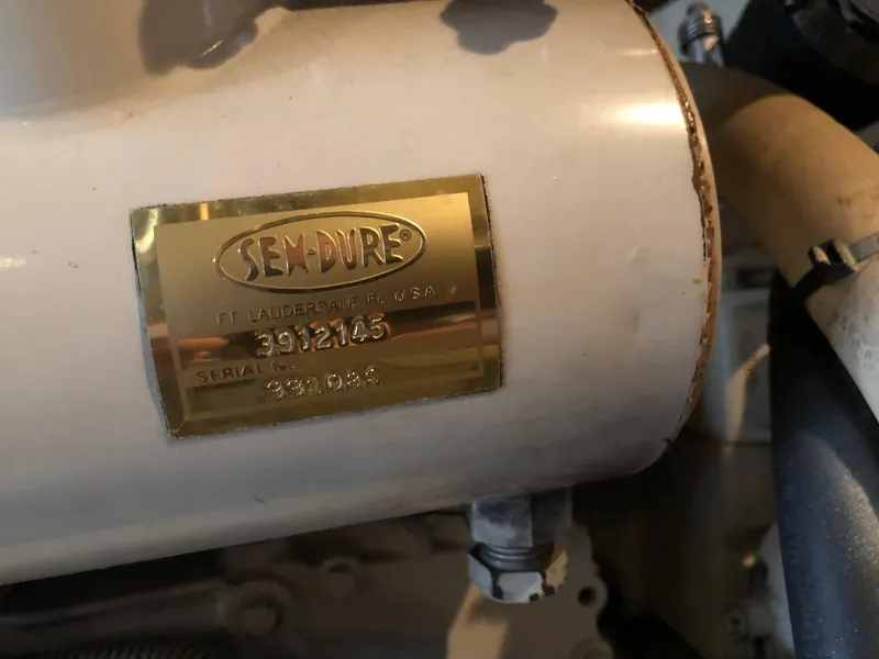 Slide: The Image of Close-up of a Sea-Dure engine part in a 1998 Carver 530 Voyager Pilothouse. - 26