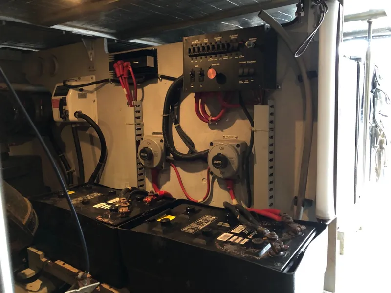 Slide: The Image of Electrical system and battery compartment of a 1998 Carver 530 Voyager Pilothouse. - 27