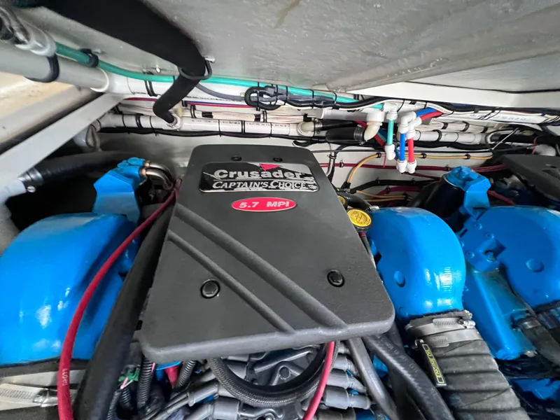 Slide: The Image of Engine compartment of a 2002 Pursuit 3000 Express with Crusader 5.7 MPI engine. - 21