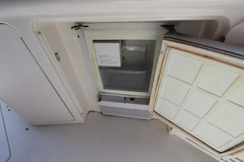 Slide: The Image of Open refrigerator on a 1999 Sea Ray 380 Sundancer boat. - 15