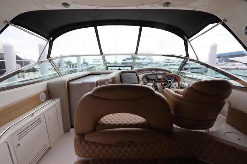 Slide: The Image of Interior view of 1999 Sea Ray 380 Sundancer yacht cockpit. - 16