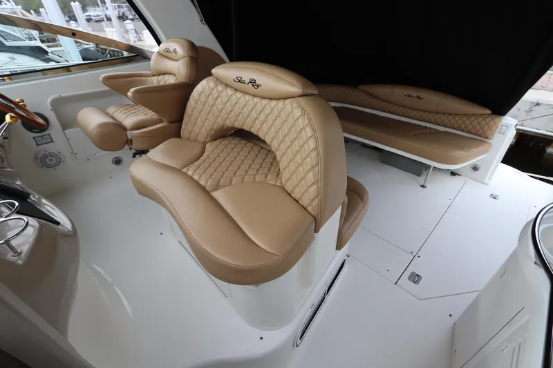 Slide: The Image of Luxurious seating on 1999 Sea Ray 380 Sundancer yacht with tan leather upholstery. - 17