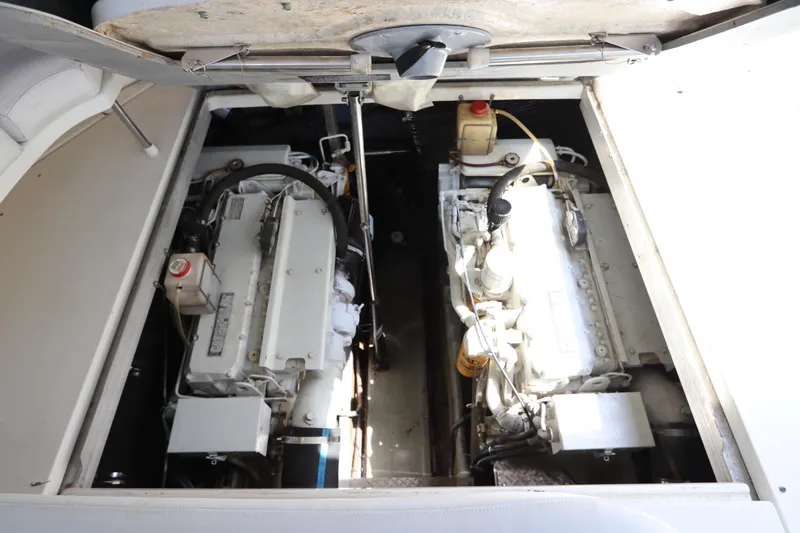 Slide: The Image of Engine compartment of a 1999 Sea Ray 380 Sundancer with twin engines. - 37
