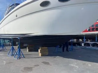 Slide: The Image of 1999 Sea Ray 380 Sundancer on dry dock for maintenance. - 39