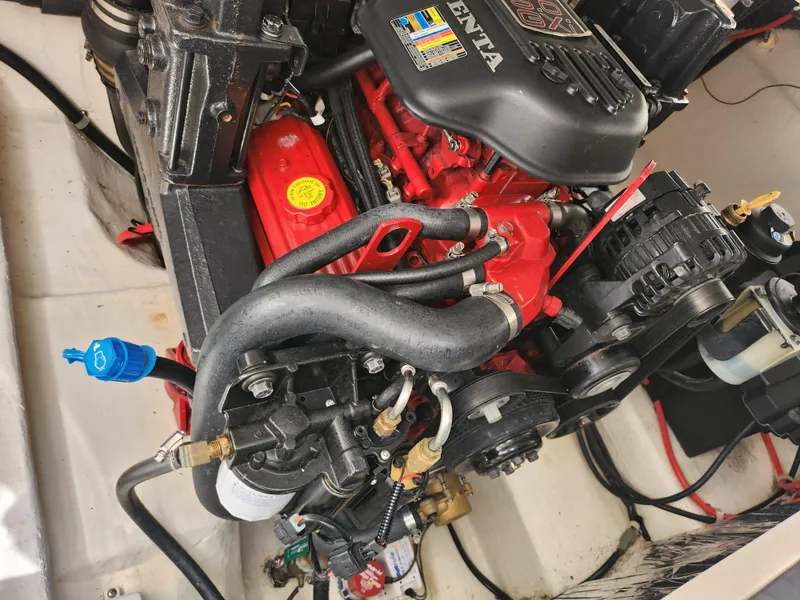 Slide: The Image of 2008 Glastron GT 249 boat engine compartment with Volvo Penta engine. - 18