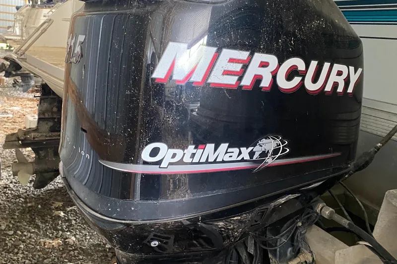 Slide: The Image of 1994 Sun Tracker PARTY HUT 30 OB with Mercury OptiMax outboard motor. - 13