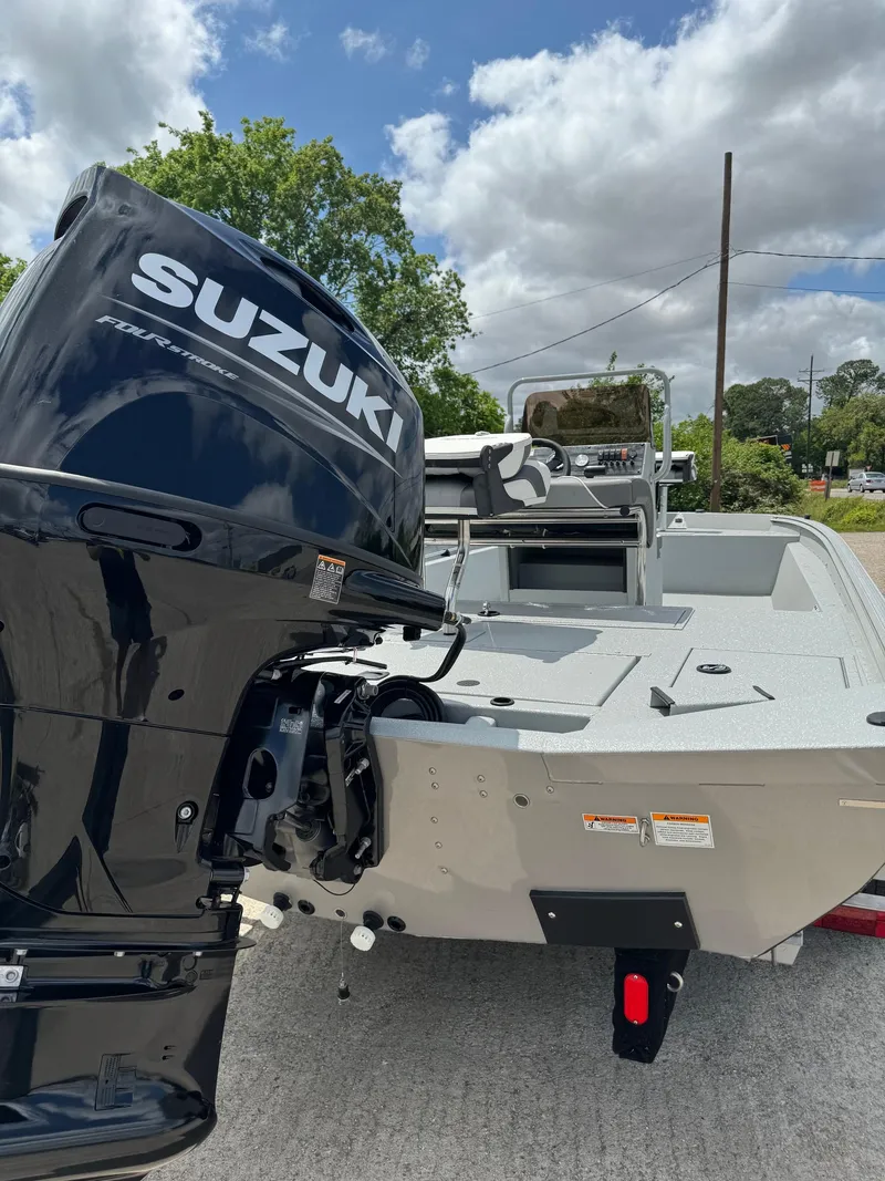 Slide: The Image of 2023 Polar Kraft SPORTX210CC boat with Suzuki outboard motor. - 4