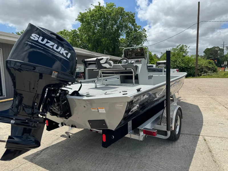 Slide: The Image of 2023 Polar Kraft SPORTX210CC boat with Suzuki outboard motor on trailer. - 5