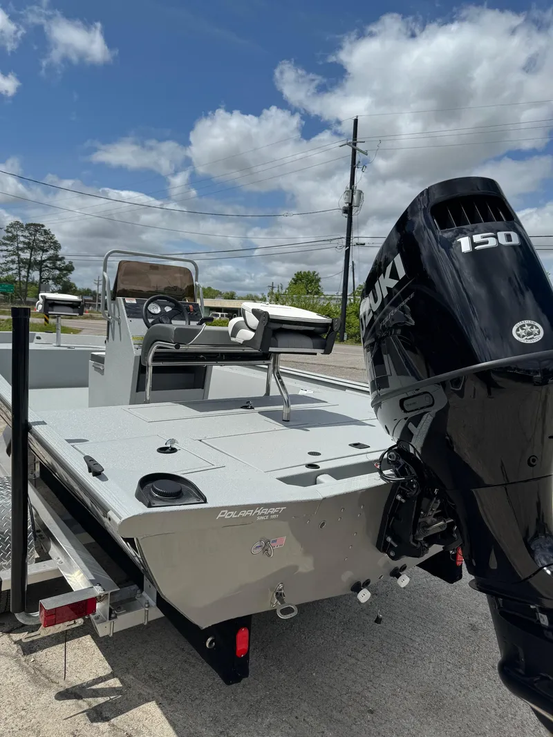 Slide: The Image of 2023 Polar Kraft SPORTX210CC boat with Suzuki 150 outboard motor. - 6