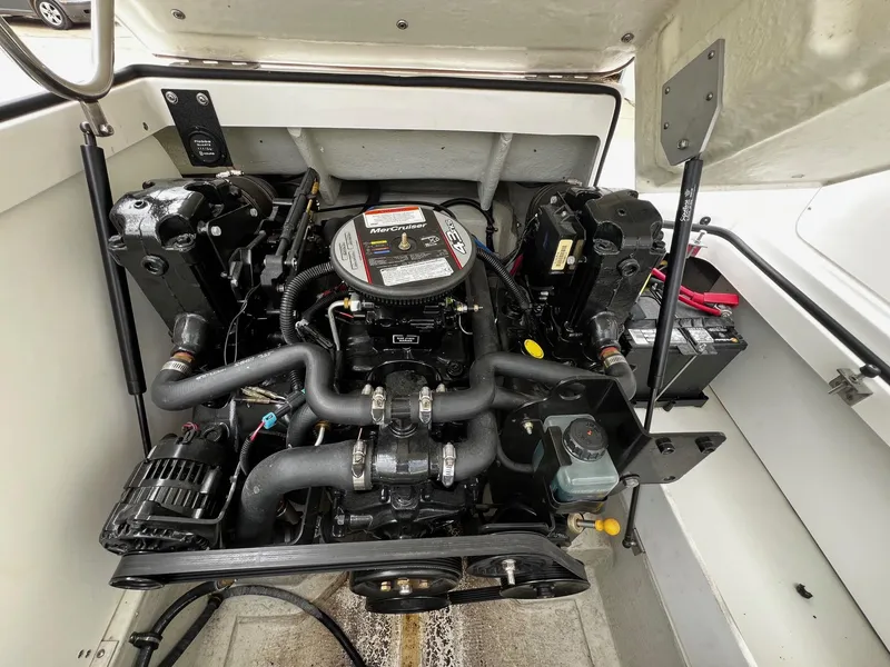 Slide: The Image of Engine compartment of a 2011 Cobalt 200 boat with MerCruiser engine. - 15
