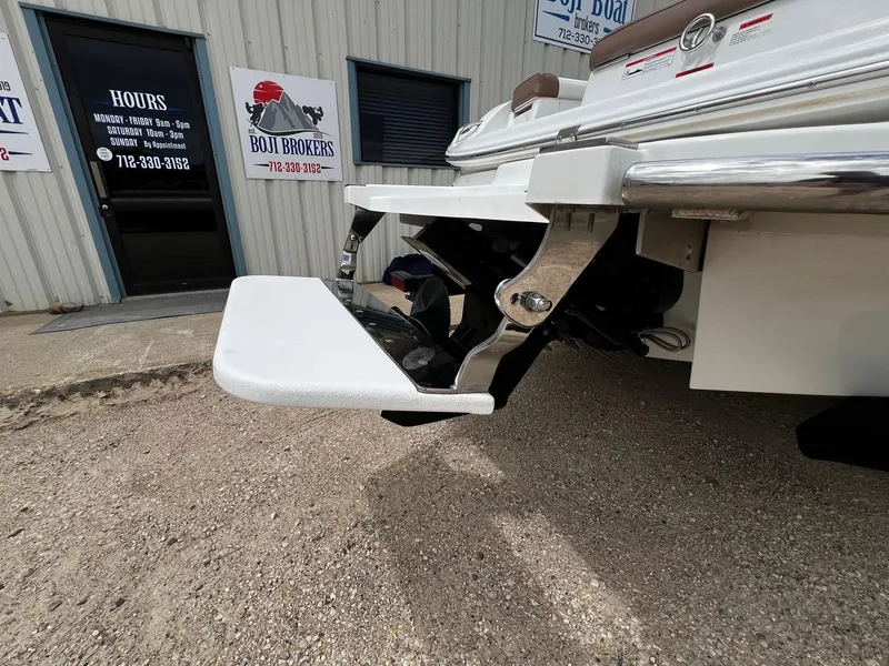 Slide: The Image of Rear view of a 2011 Cobalt 200 boat at Boji Brokers dealership. - 23