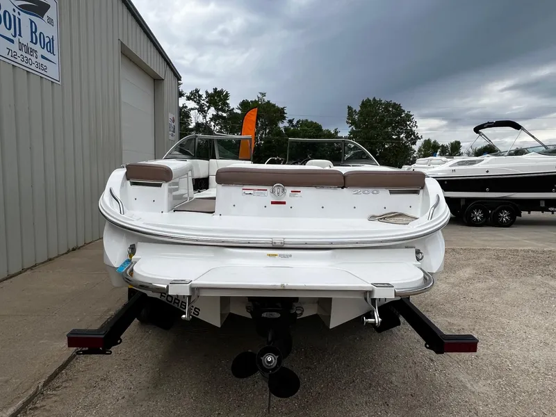 Slide: The Image of 2011 Cobalt 200 boat on trailer at dealership. - 7