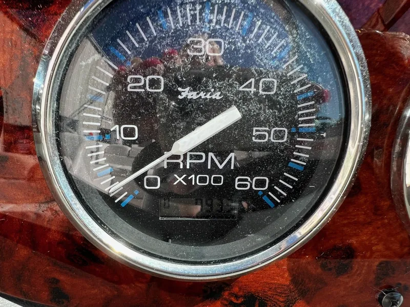 Slide: The Image of Close-up of RPM gauge on 2004 Regal 2200 Bowrider boat dashboard. - 13