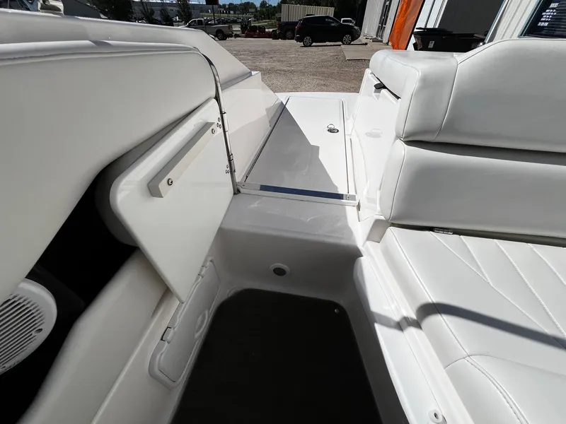 Slide: The Image of 2004 Regal 2200 Bowrider interior seating and storage compartment. - 20