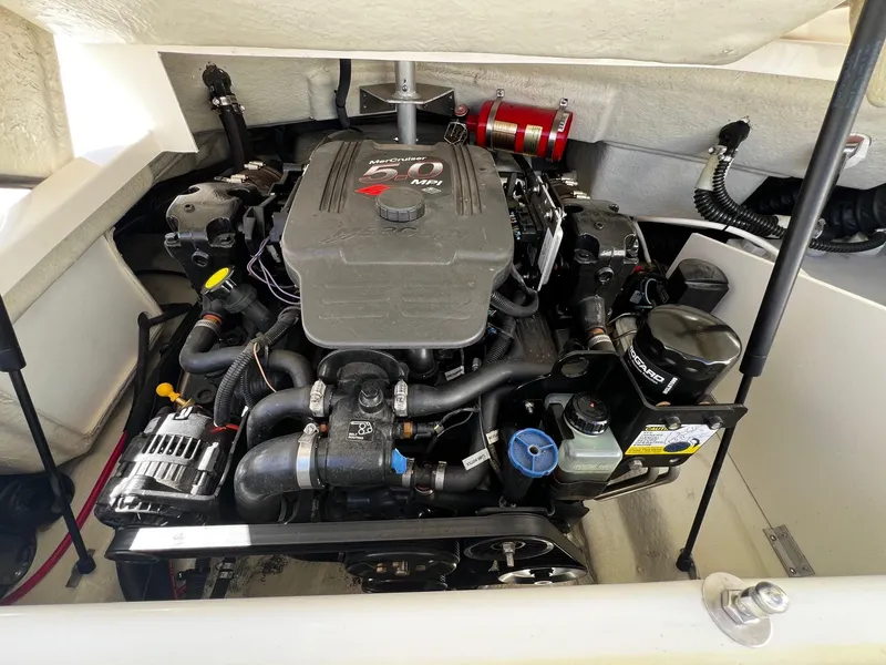 Slide: The Image of 2004 Regal 2200 Bowrider engine compartment with MerCruiser 5.0 MPI engine. - 23