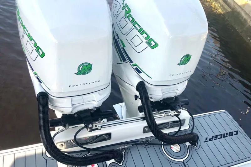 Slide: The Image of Twin outboard engines on a 2020 Concept 36' Cuddy Cabin boat. - 11