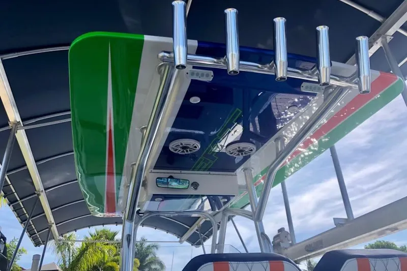 Slide: The Image of 2020 Concept 36' Cuddy Cabin boat with colorful T-top and rod holders. - 5