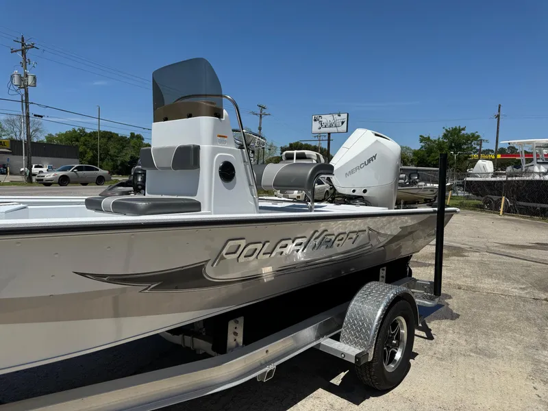 Slide: The Image of 2023 Polar Kraft BAY210CC boat on trailer with Mercury outboard motor. - 4