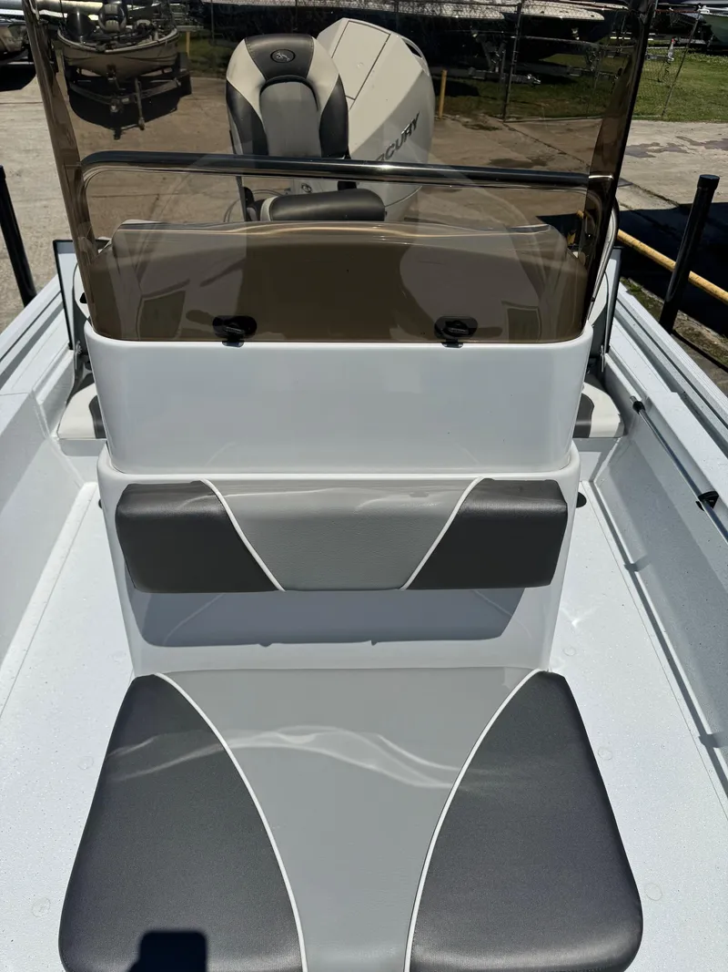 Slide: The Image of 2023 Polar Kraft BAY210CC boat interior with seating and console. - 7
