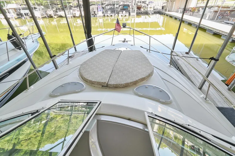 Slide: The Image of 2008 Cruisers Yachts 330 Express bow view in marina. - 35