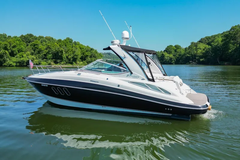 Slide: The Image of 2008 Cruisers Yachts 330 Express on a serene lake. - 14