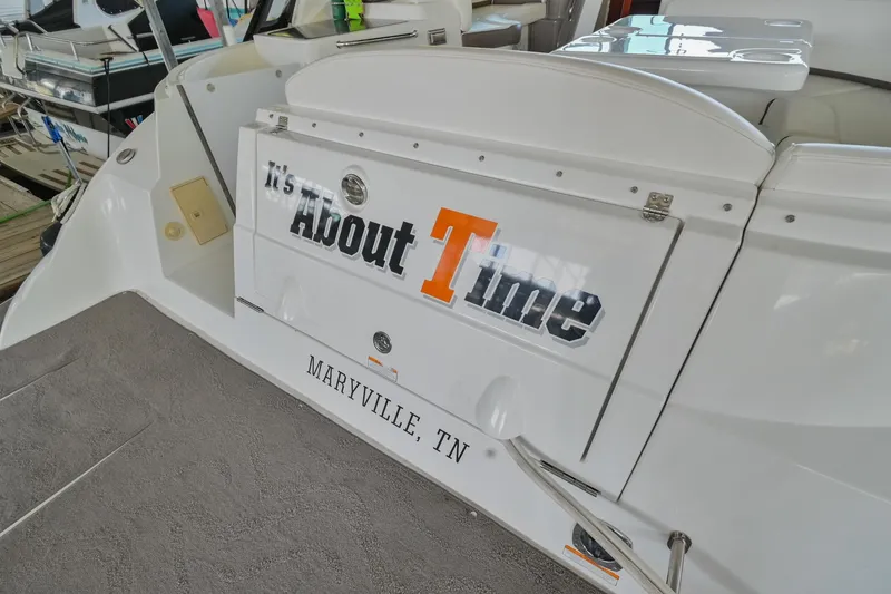 Slide: The Image of 2008 Cruisers Yachts 330 Express boat stern with It's About Time text, Maryville, TN. - 18