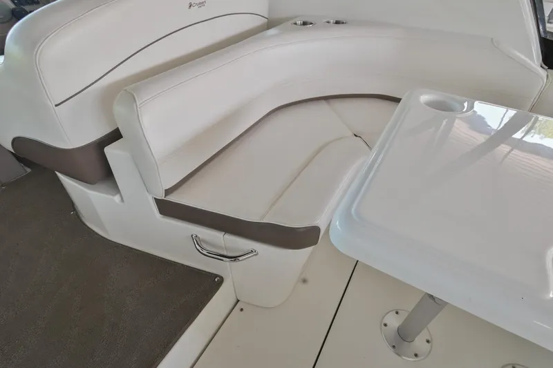 Slide: The Image of 2008 Cruisers Yachts 330 Express interior seating and table. - 23