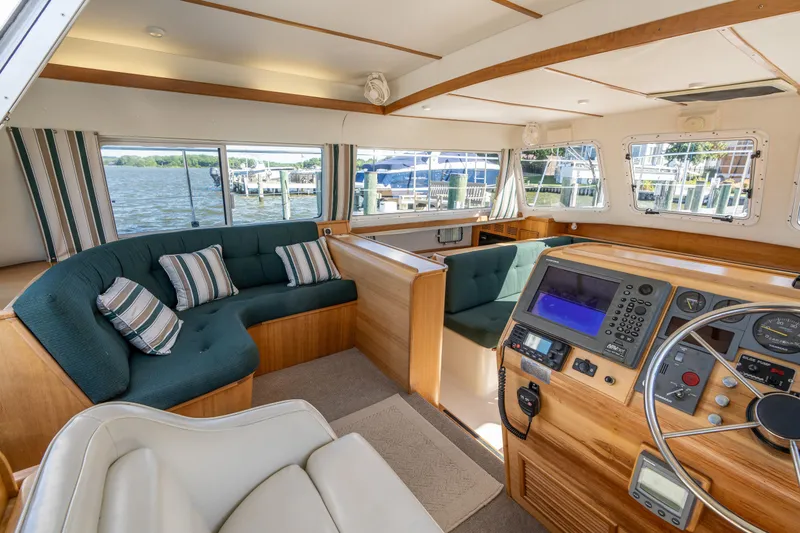 Slide: The Image of Interior of 2002 PDQ Power Catamaran MV/34 Passagemaker with helm and seating area. - 17