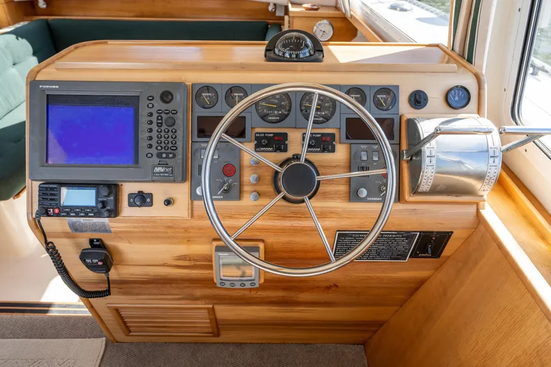 Slide: The Image of 2002 PDQ Power Catamaran MV/34 Passagemaker helm with navigation equipment and controls. - 18