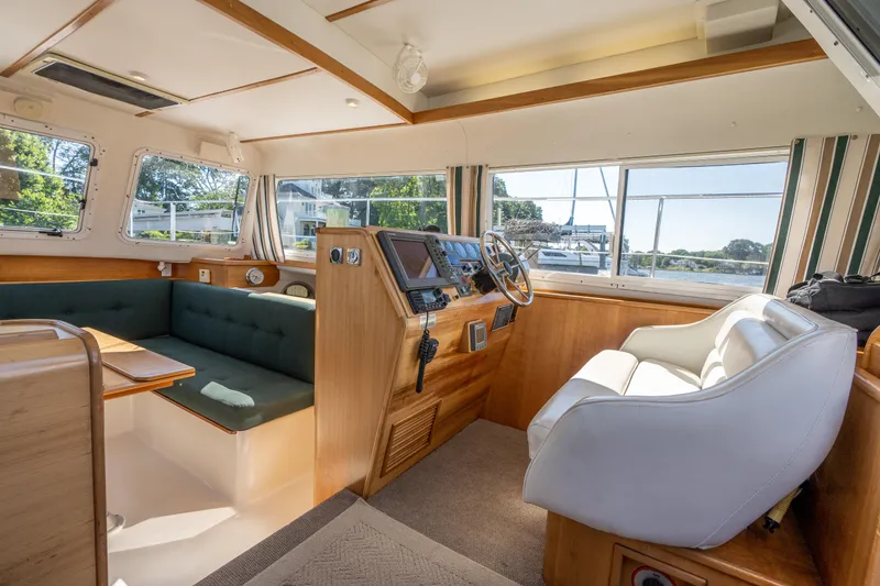 Slide: The Image of Interior of 2002 PDQ Power Catamaran MV/34 Passagemaker with helm station and seating area. - 20