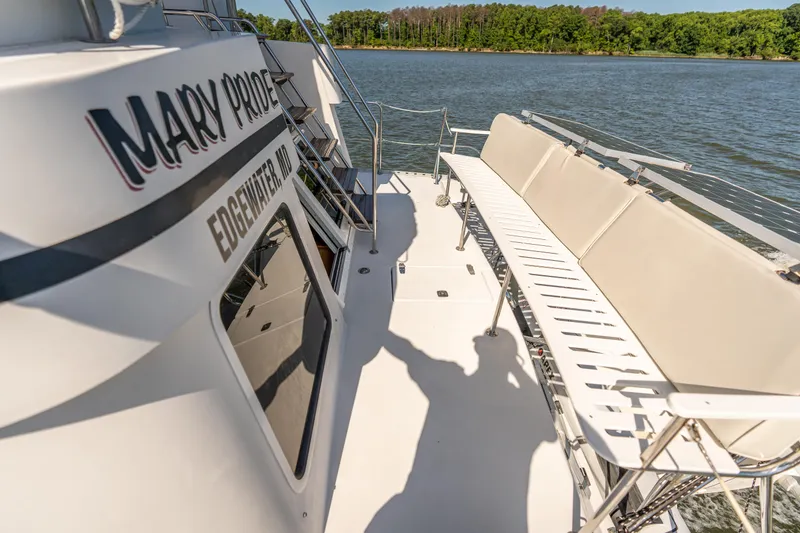 Slide: The Image of 2002 PDQ Power Catamaran MV/34 Passagemaker deck with seating and water view. - 41