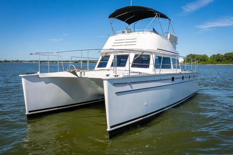 Slide: The Image of 2002 PDQ Power Catamaran MV/34 Passagemaker on calm waters. - 5