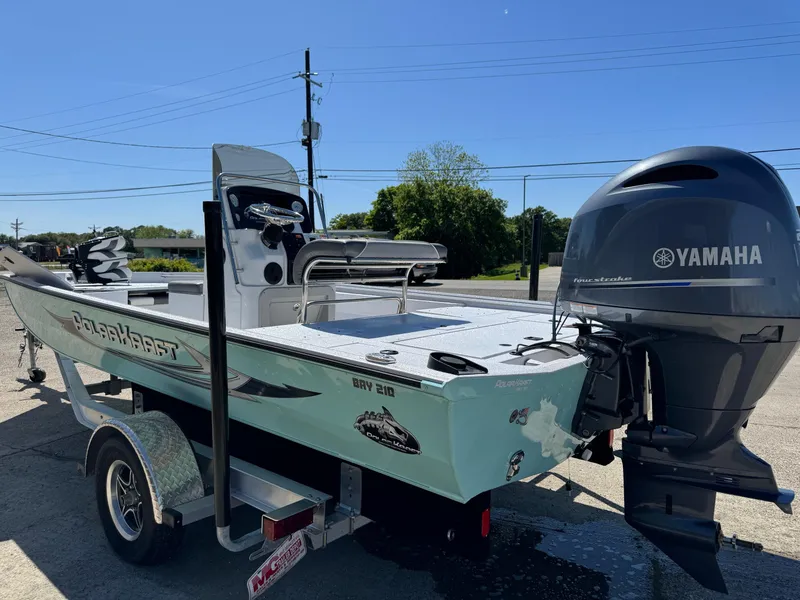 The Image of 2023 Polar Kraft BAY210CC boat with Yamaha outboard motor on trailer. - 0