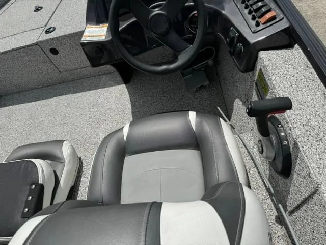 Slide: The Image of 2023 Polar Kraft 195 Pro boat interior with steering wheel and seating. - 5