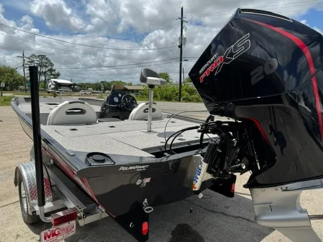 Slide: The Image of 2023 Polar Kraft 195 Pro boat with powerful engine on trailer. - 7