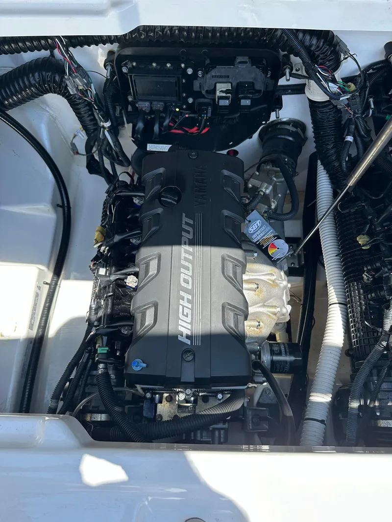 Slide: The Image of Yamaha Boats SX250 2022 model engine compartment showcasing high output engine. - 11