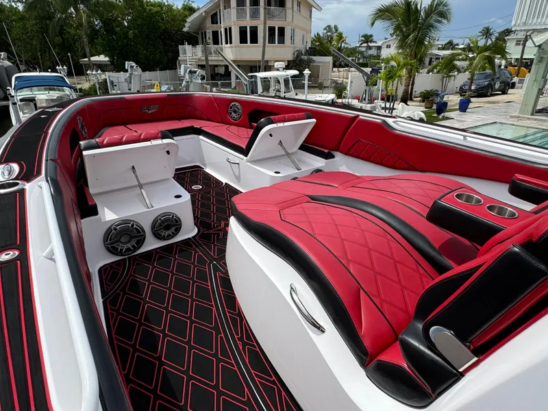 Slide: The Image of Luxurious 2022 Deep Impact 399 boat interior with red and black seating and modern design. - 35