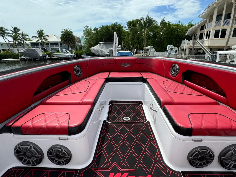 Slide: The Image of Luxurious 2022 Deep Impact 399 boat with red seating and stylish design. - 39