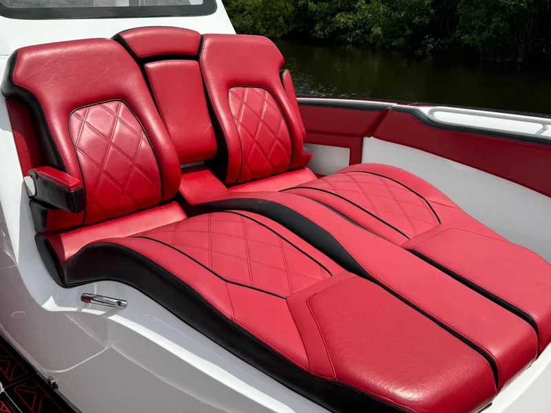 Slide: The Image of Luxurious red leather seats on 2022 Deep Impact 399 boat. - 43
