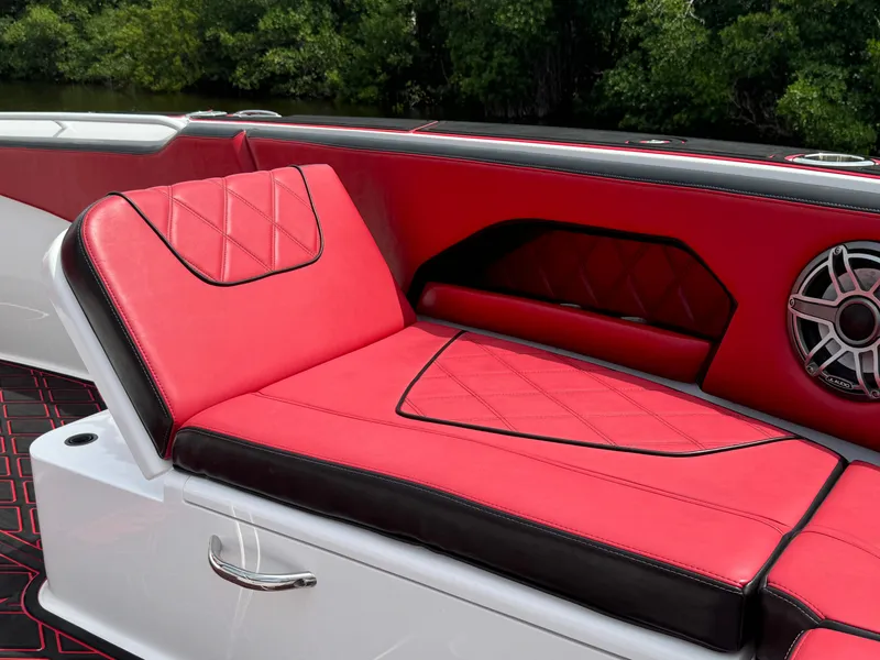 Slide: The Image of Luxurious red and black seating on 2022 Deep Impact 399 boat, featuring stylish design. - 44
