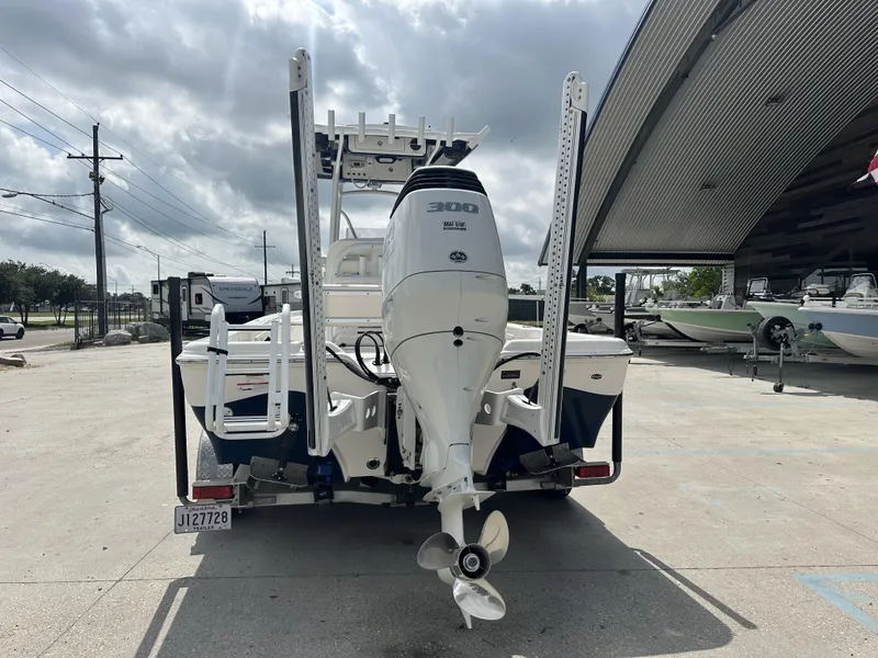 Slide: The Image of 2022 Blue Wave 2400 PURE BAY boat with 300 HP engine, rear view. - 11