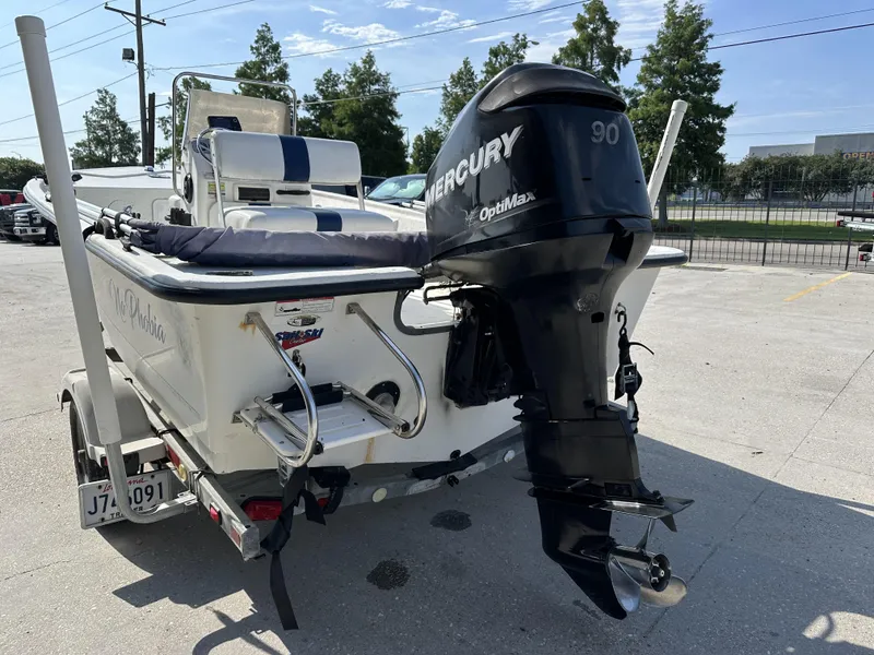 Slide: The Image of 2009 Trophy 181 Bay Boat with Mercury 90 OptiMax engine on trailer. - 10
