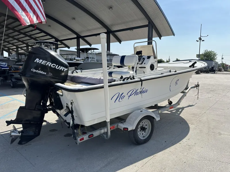 Slide: The Image of 2009 Trophy 181 Bay Boat with Mercury OptiMax engine on trailer. - 3