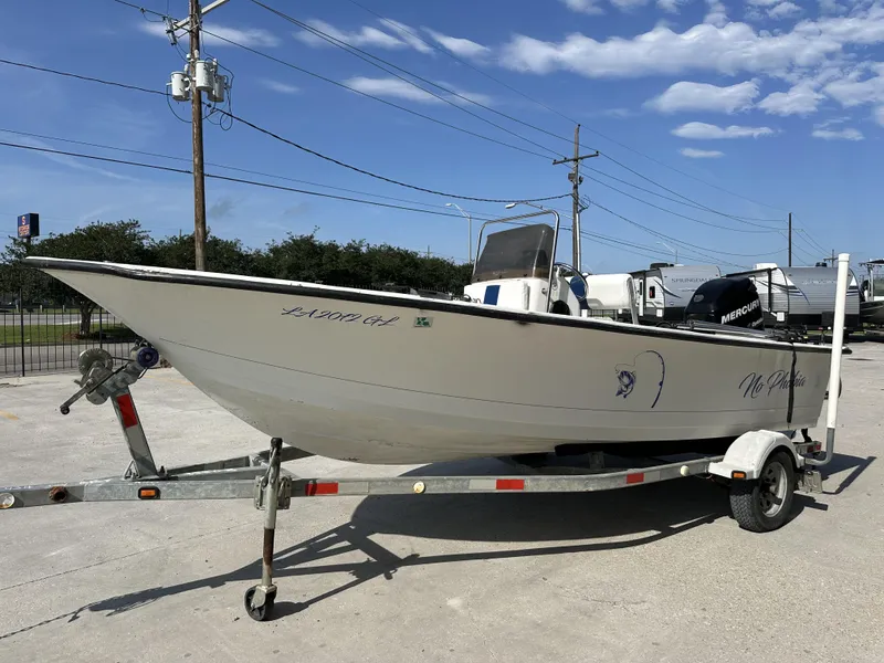 Slide: The Image of 2009 Trophy 181 Bay Boat on trailer with Mercury outboard motor. - 4
