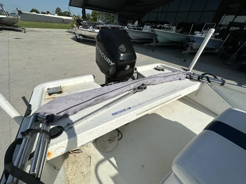 Slide: The Image of 2009 Trophy 181 Bay Boat with Mercury outboard motor in a boatyard. - 8