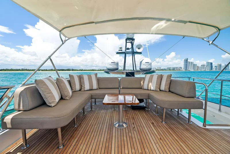 Slide: The Image of Luxurious 2019 Azimut 77S yacht deck with elegant seating and ocean view. - 10